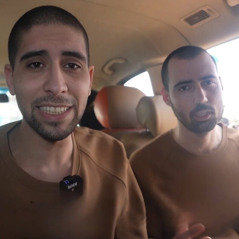 Hostages Guy Gilboa-Dalal and Evyatar David being forced to watch the ceremony of other captives being released in a Hamas propaganda video, the Gaza Strip, Feb. 22, 2025. Source: Israel Hayom.