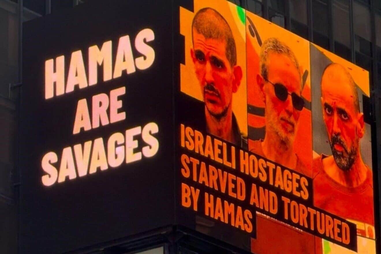 An advertisement sponsored by the Israeli consul general in New York showing three Israeli hostages who were released on Feb. 8, 2025, which will be on display in Times Square, New York City, February 2025. Source: Screenshot.