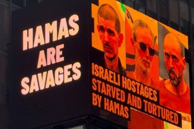 An advertisement sponsored by the Israeli consul general in New York showing three Israeli hostages who were released on Feb. 8, 2025, which will be on display in Times Square, New York City, February 2025. Source: Screenshot.