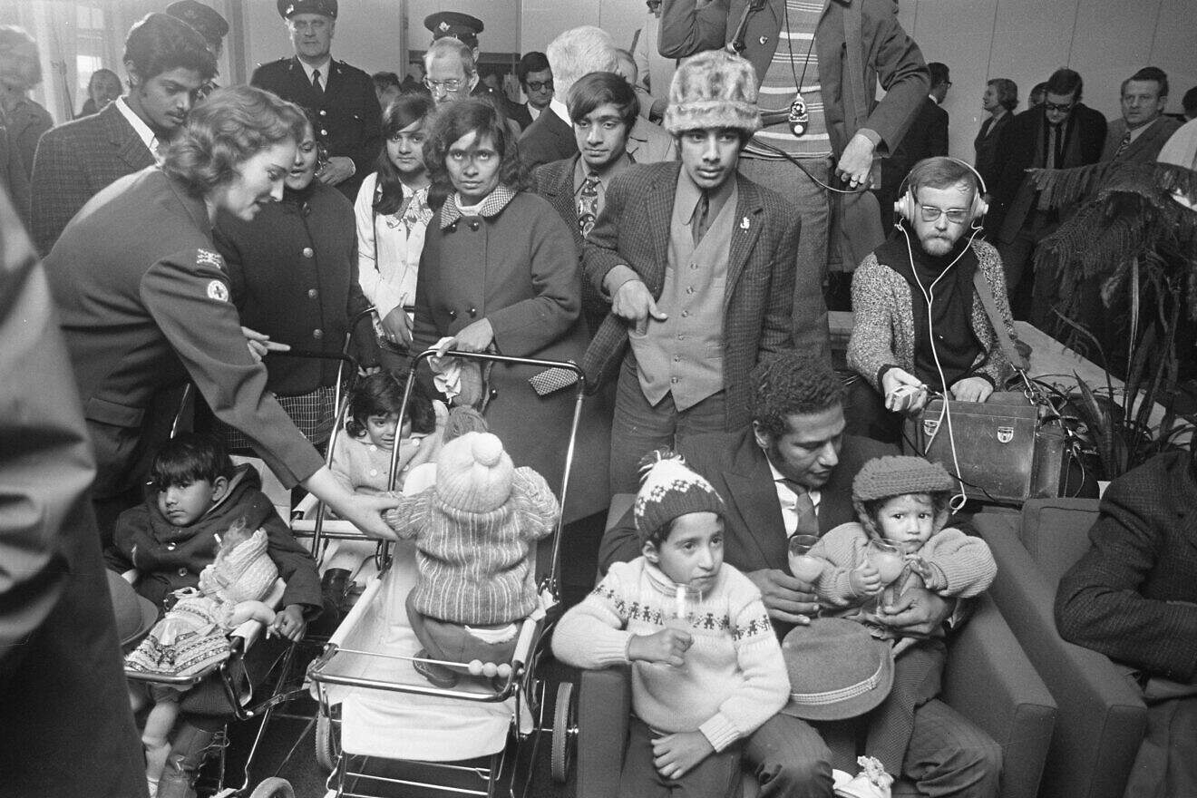 Indians arrive at Schiphol Airport in Amsterdam after being expelled from Uganda, Nov. 24, 1972. Credit: Bert Verhoeff for Anefo/Netherlands National Archive via Wikimedia Commons.