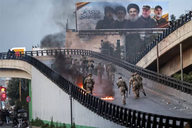 Lebanese Army riot-control forces attempt to disperse a Hezbollah-organized rally blocking the road to Beirut International Airport on Feb. 15, 2025. Photo by Ibrahim AMRO/AFP via Getty Images.