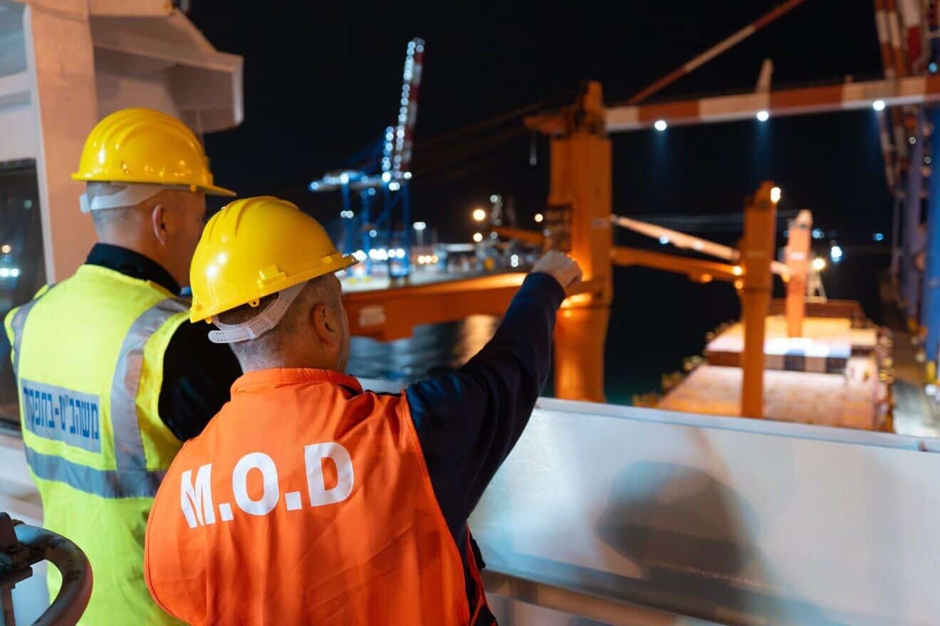 Israeli Defense Ministry personnel coordinate the arrival of U.S. MK-84 heavy bombs to the Port of Ashdod on Feb. 15, 2025. Photo credit: Israel Ministry of Defense.