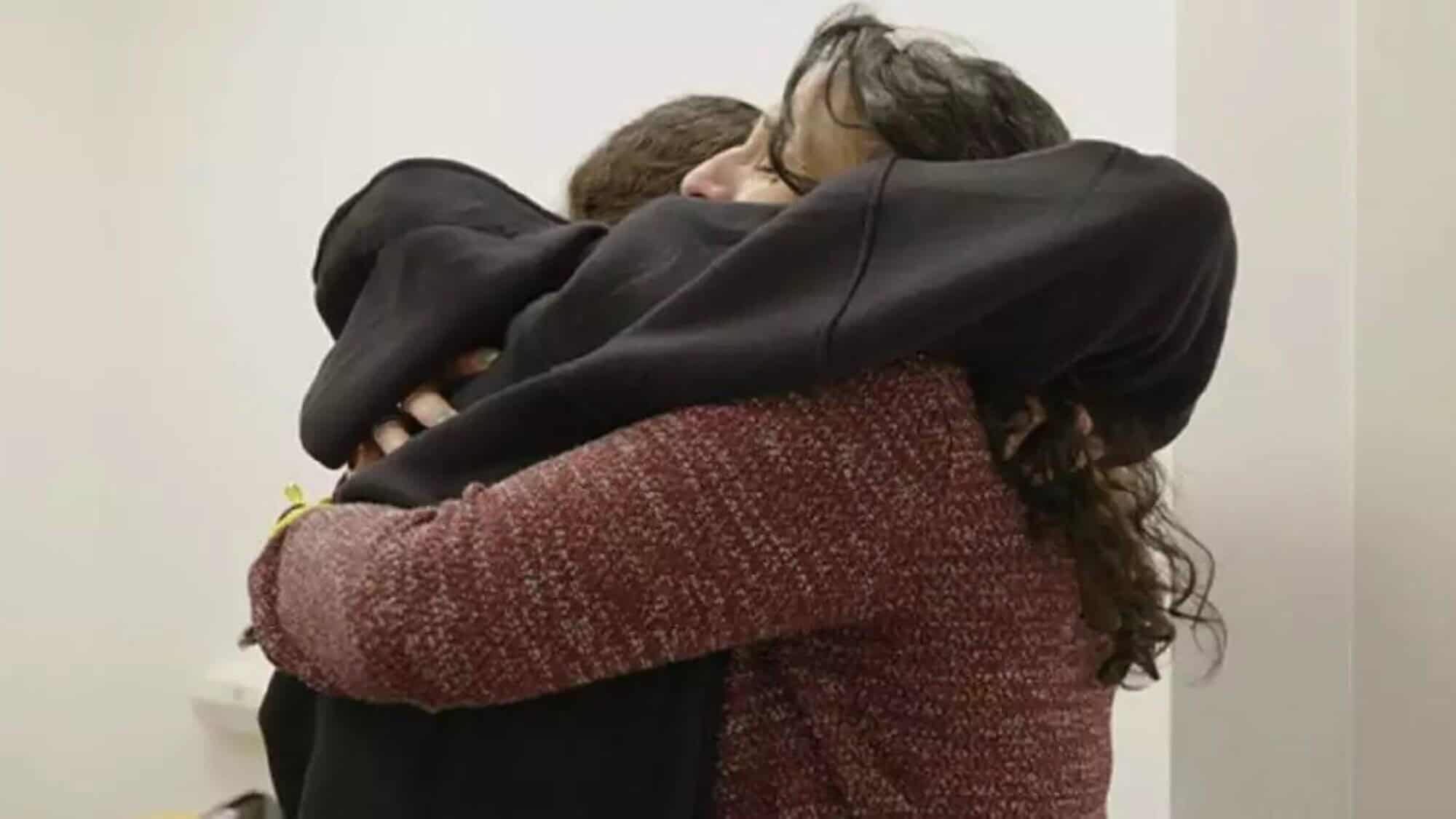 Meirav Leshem-Gonen (right) embraces her daughter, released hostage Romi Gonen, after 471 days of Hamas captivity, Jan. 19, 2025. Credit: IDF.