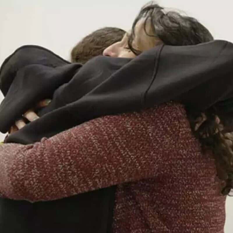 Meirav Leshem-Gonen (right) embraces her daughter, released hostage Romi Gonen, after 471 days of Hamas captivity, Jan. 19, 2025. Credit: IDF.