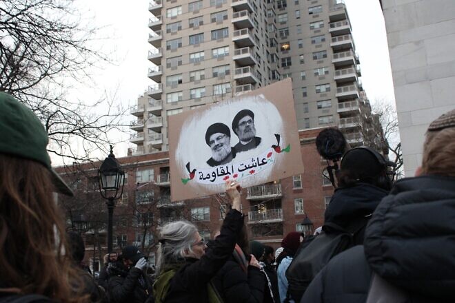 Anti-Israel protesters attend a vigil honoring the former Hezbollah terror leader Hassan Nasrallah in Washington Square Park in lower Manhattan, Feb. 23, 2025. Photo by Emily Goldberg.
