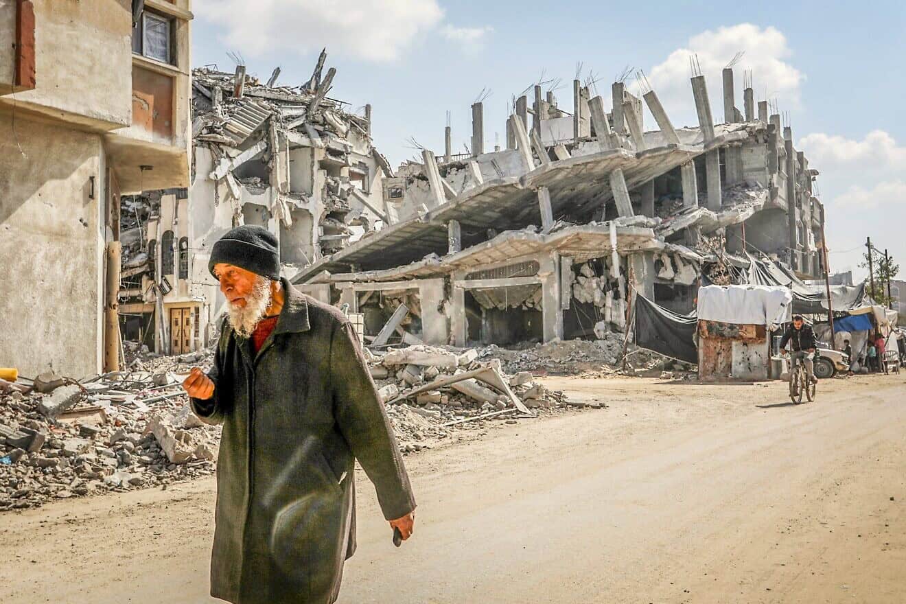 A Palestinian man walks among the rubble in the city of Khan Yunis in the southern Gaza Strip, Feb. 16, 2025. Photo by Abed Rahim Khatib/Flash90.