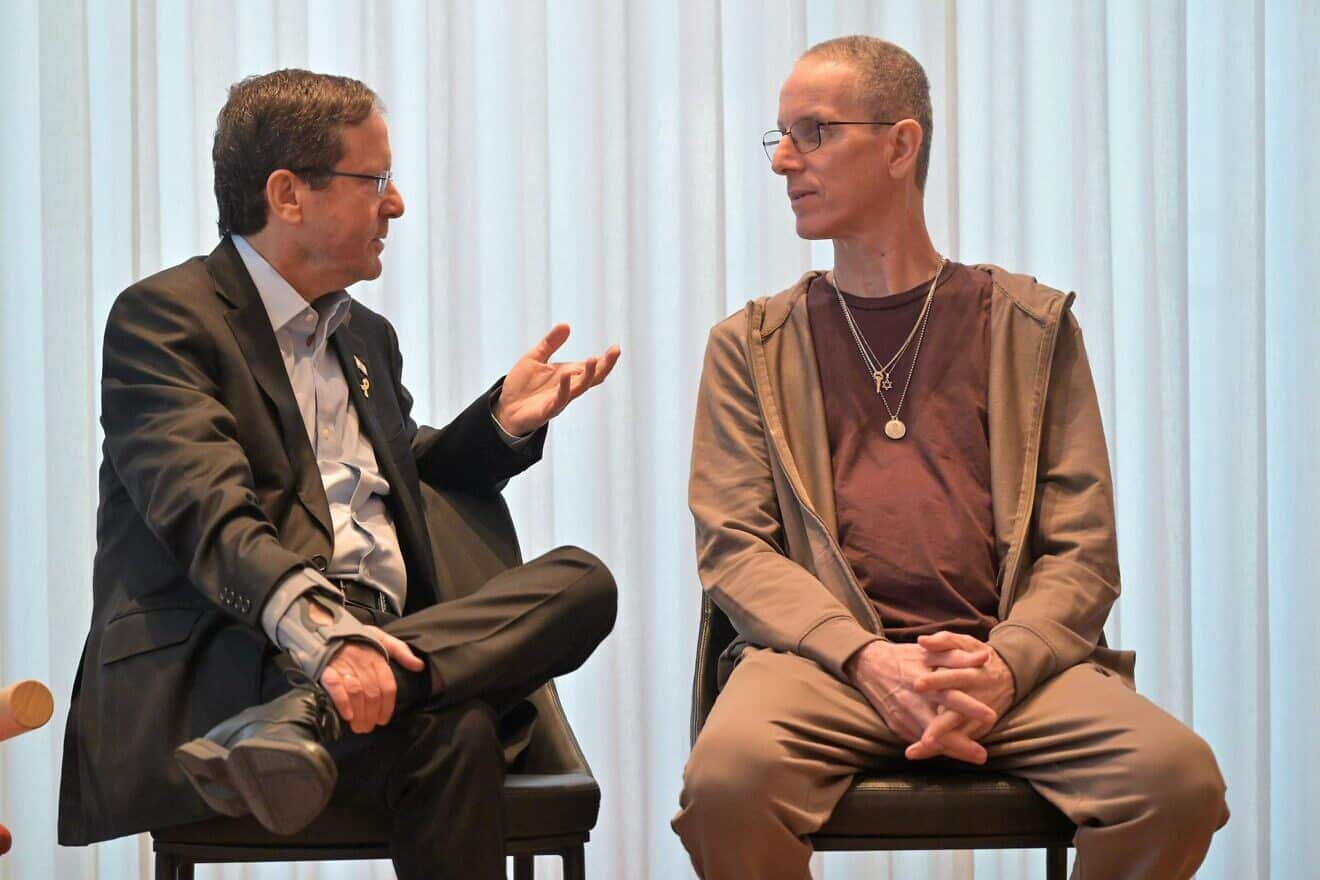 Israeli President Isaac Herzog, left, speaks with former Israeli hostage Ohad Ben Ami in Jerusalem on Feb. 17, 2025. Photo by Koby Gideon/GPO.