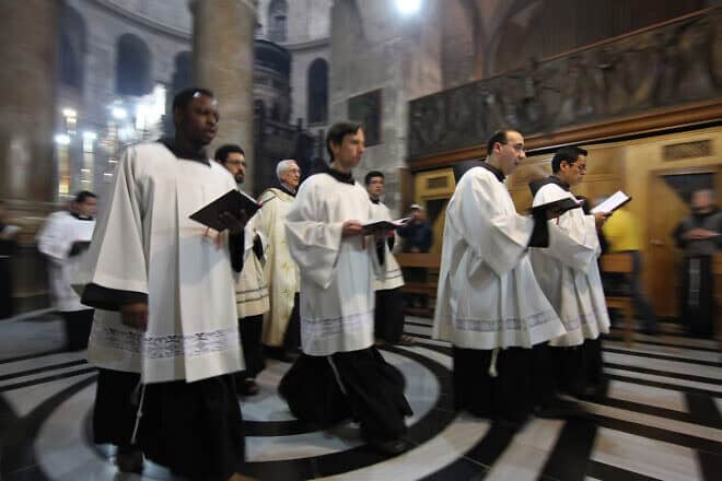 Christian clergymen attend a procession inside the Church of the Holy Sepulchre in Jerusalem's Old City on March 13, 2012. Photo by Nati Shohat/Flash90.