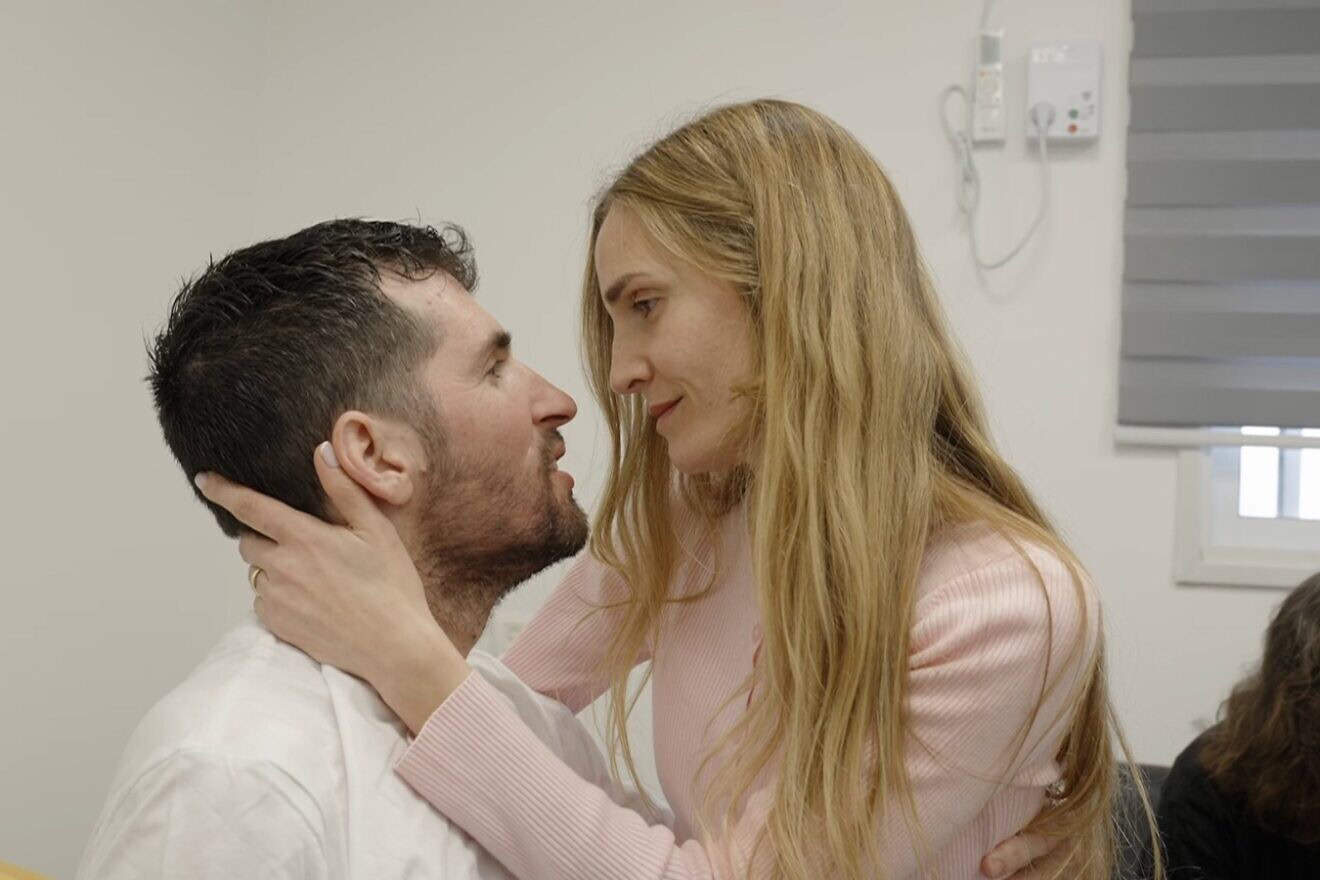 Released hostage Sagui Dekel-Chen reunites with his wife, Avital, and parents, Neomit and Jonathan, at the IDF's Re'im camp on the Gaza border, Feb. 15, 2025. Credit: IDF Spokesperson's Office.