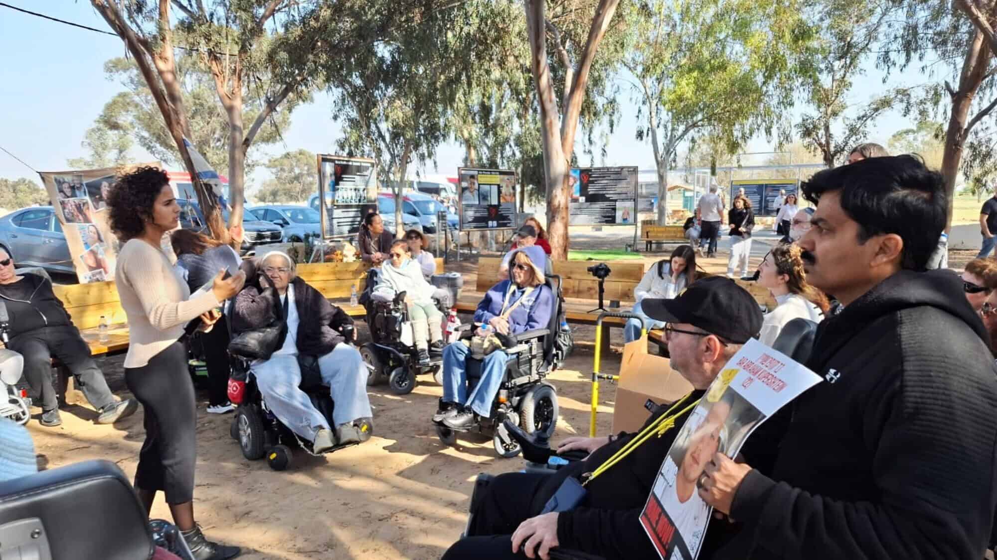 “Accessible Pathways” tour participants gather to see sites associated with the Hamas-led Oct. 7 terrorist attacks in southern Israel, Jan. 30, 2023. Credit: Courtesy of Yad Sarah.