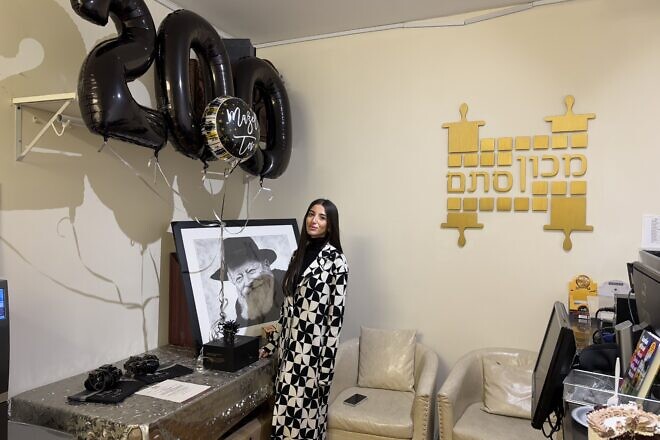 Mary Jarada, 23, founder of the charity campaign Tefillin on Us, at Machon Stam in the Crown Heights neighborhood of Brooklyn, N.Y., from which she had just purchased her 200th pair of tefillin to donate, Jan. 8, 2025. Photo by Vita Fellig.