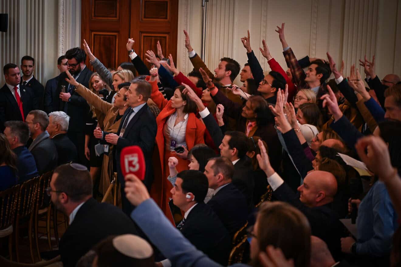 Journalists raise their hands during a joint press conference given by U.S. President Donald Trump and Israeli Prime Minister Benjamin Netanyahu at the White House in Washington D.C., on Feb. 4, 2025. Photo by Liri Agami/Flash90.