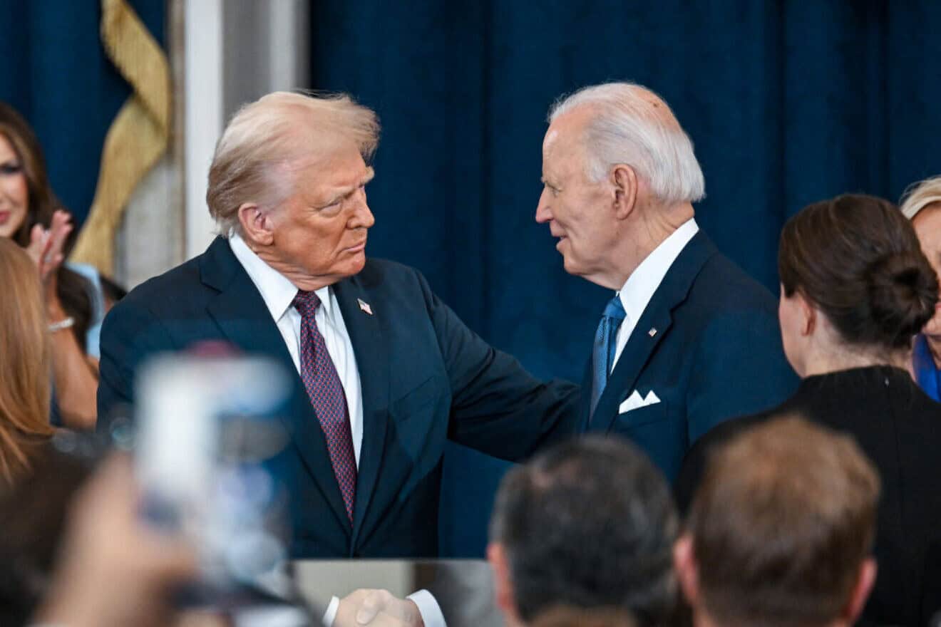U.S. President-elect Donald Trump and U.S. President Joe Biden at Trump's inauguration in the U.S. Capitol Rotunda in Washington on Jan. 20, 2025. Photo by Kenny Holston-Pool/Getty Images.