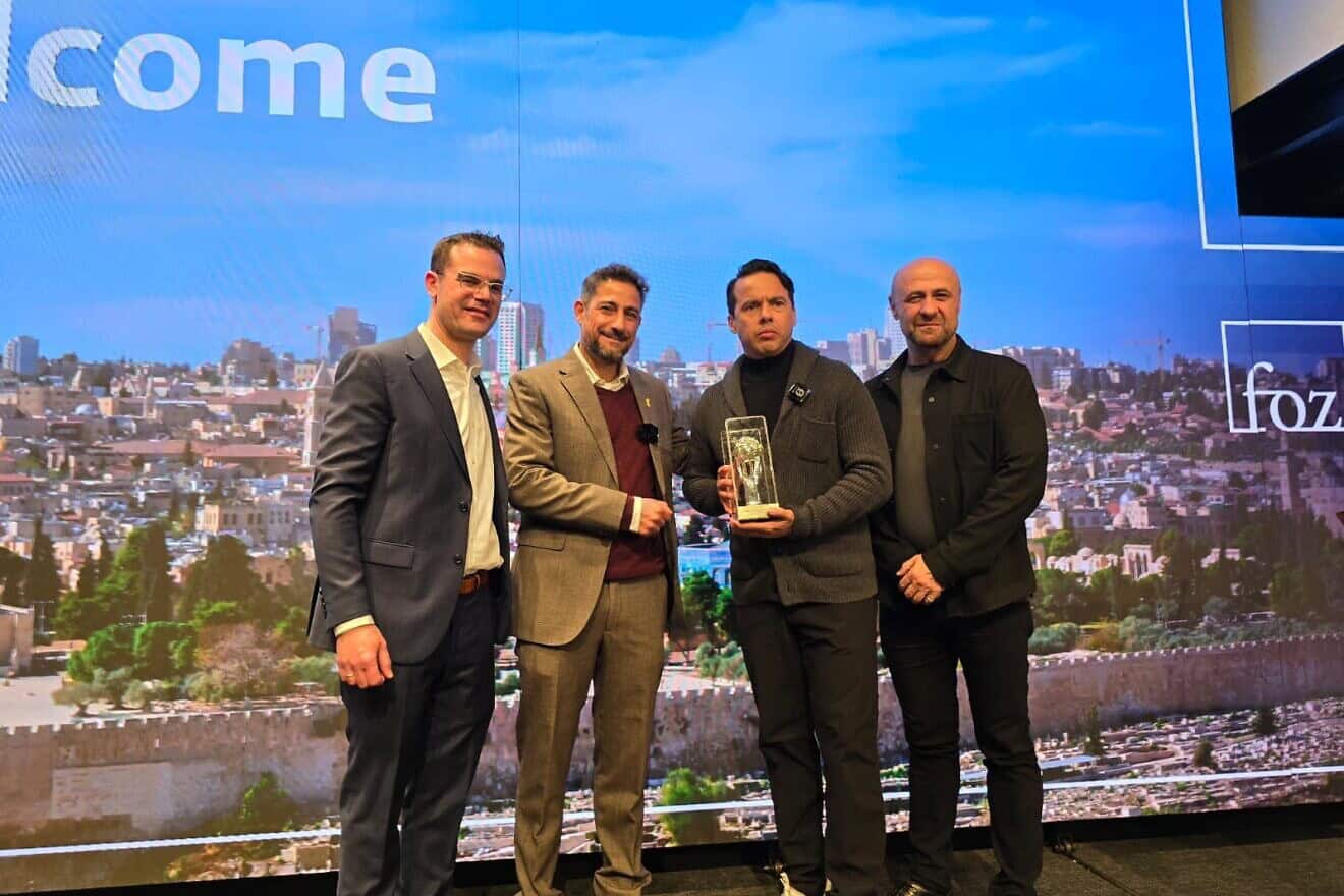 Samuel Rodriguez receives an award for suoort for Israel at Jerusalem's Friend of Zion Museum on Monday night.  Credit Tal Marom.