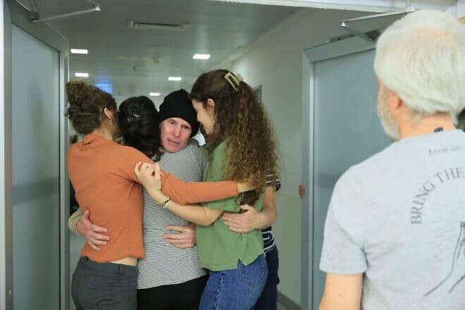 Freed American-Israeli hostage Keith Siegel, accompanied by his wife, Aviva, reunites with his daughters Elan, Gal and Shir, and his brother Lee, at Sourasky Medical Center (Ichilov Hospital) in Tel Aviv on Feb. 1, 2025. Photo by Ronen Harish/GPO.