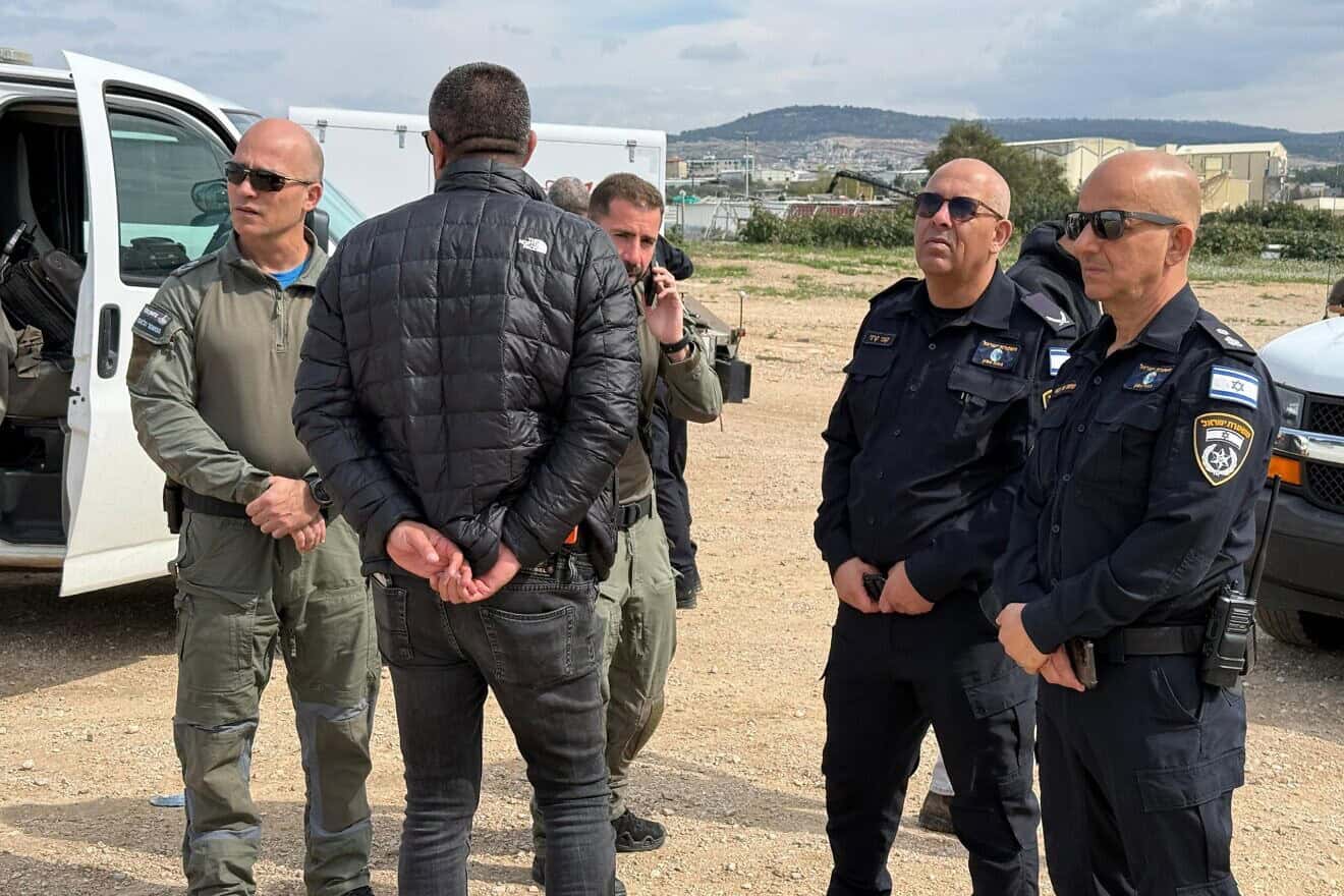 Israeli security personnel at the scene where a suspect was arrested with a suspicious object on his body, near Tamra in the Lower Galilee, Feb. 14, 2025. Credit: Israel Police.
