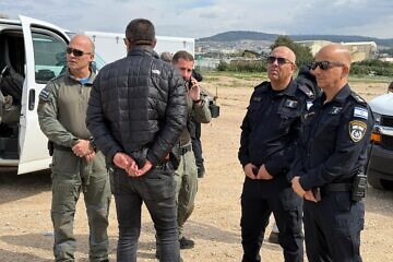 Israeli security personnel at the scene where a suspect was arrested with a suspicious object on his body, near Tamra in the Lower Galilee, Feb. 14, 2025. Credit: Israel Police.