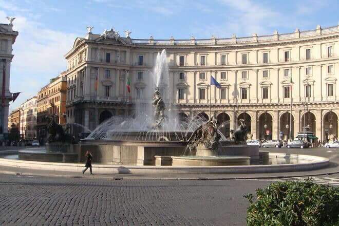 A woman walks past Piazza della Repubblica in  Rome, Italy on Nov. 7, 2007. Photo by Fabiano Licosp/Wikimedia Commons.