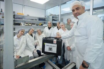 Tevel 2 project students testing environmental conditions at the satellite laboratory at Tel Aviv University. Photo by Ronen Horesh.