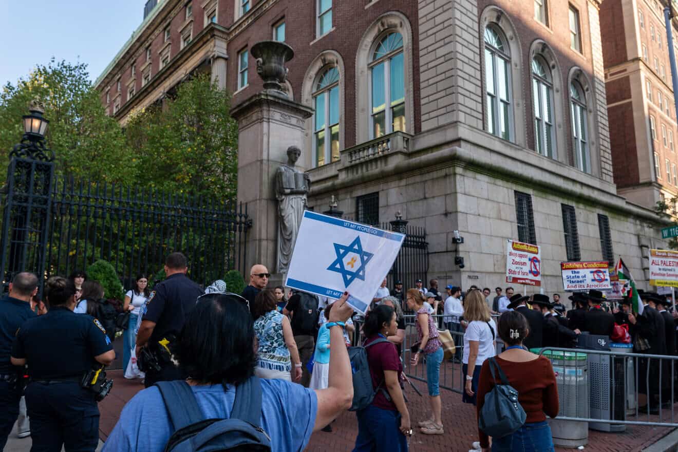 Pro-Israel demonstrators and pro-Palestinian/pro-Hamas counter-protesters gather in front of Columbia University in  New York City to hold an “Unmask Campus Hate” rally at the start of the new academic year in New York City, on Aug. 27, 2024.  Photo by Spencer Platt/Getty Images.