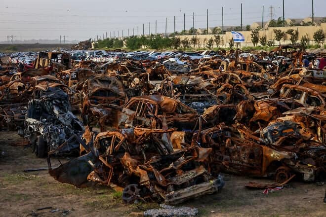 A view of cars charred by Hamas terrorists during the massacre in southern Israel on Oct. 7, 2023, at a field near the Israeli border with the Gaza Strip, Nov. 26, 2023. Photo by Yossi Zamir/Flash90.