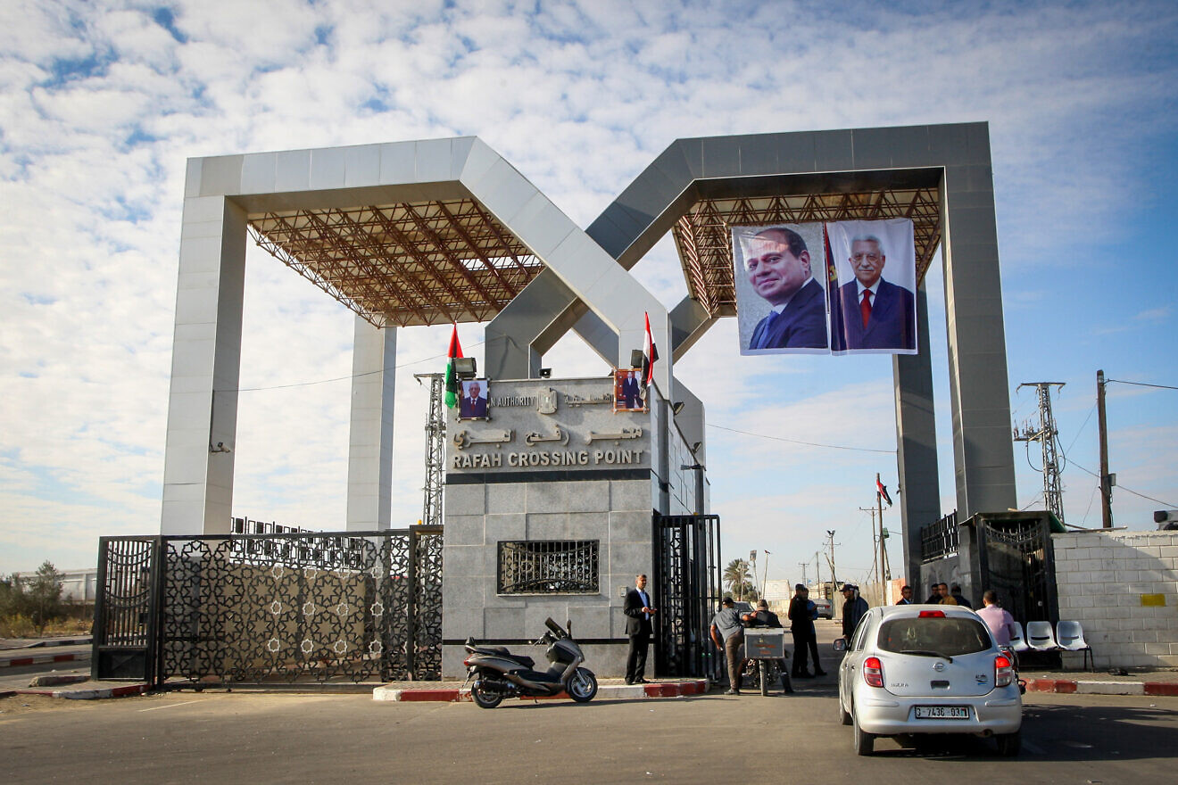 Portraits of Egyptian President Abdel Fattah al-Sisi and Palestinian leader Mahmoud Abbas hang at the Rafah border crossing with Egypt on Nov. 1, 2017. Credit: Abed Rahim Khatib/Flash90.