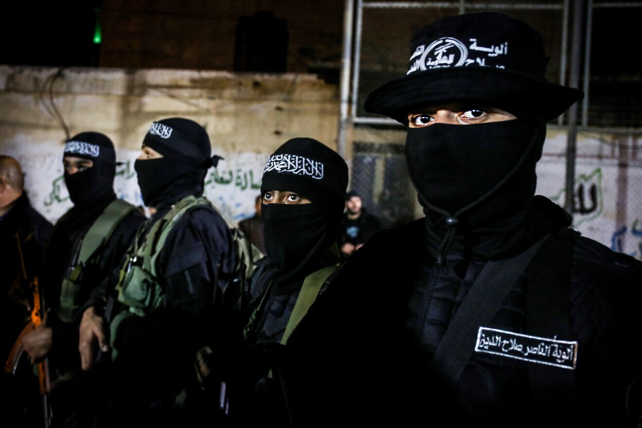 Terrorists from the Al-Nasser Brigades, part of the Popular Resistance Committees, during a memorial service for of Palestinian Islamic Jihad senior leader Baha Abu Al-Ata, In the Southern Gaza Strip, Dec. 6, 2019. Photo by Fadi Fahd/Flash90.