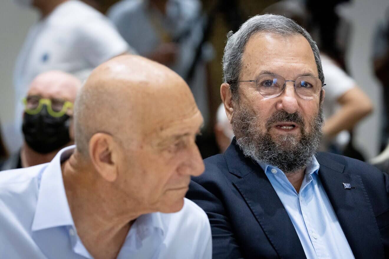 Former Israeli prime ministers Ehud Olmert and Ehud Barak attend a memorial ceremony to mark the 26th anniversary of former Prime Minister Yitzhak Rabin's assassination, Oct. 18, 2021. Photo by Yonatan Sindel/Flash90.