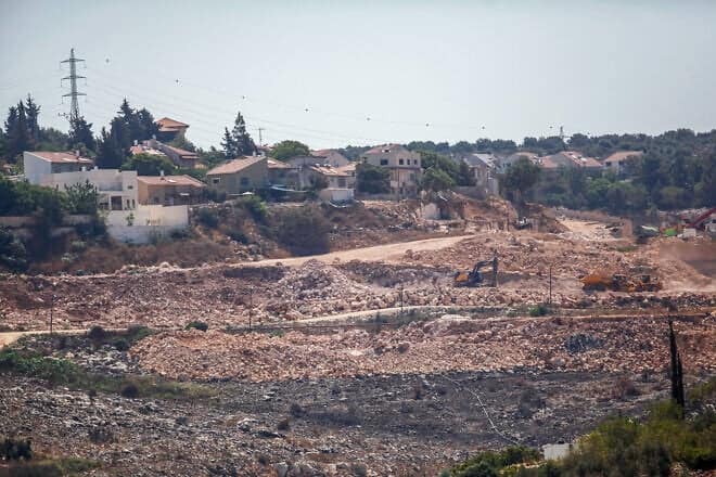 Construction work on new housing in the Jewish community of Kiryat Netafim, south of the Samaria city of Nablus, July 20, 2022. Photo by Nasser Ishtayeh/Flash90.