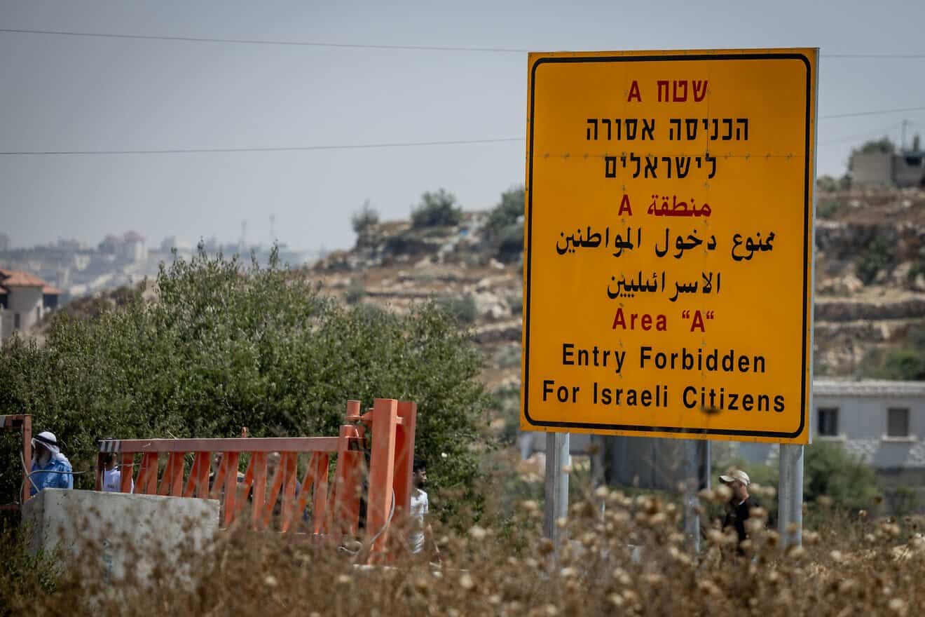 A sign on Route 60 near Hebron in Judea warning Israelis against entering Area A, which is under control of the Palestinian Authority, Aug. 21, 2023. Photo by Chaim Goldberg/Flash90.