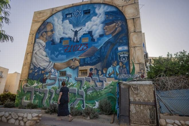 Graffiti in the Mishor Hagefen neighborhood that was attacked by Hamas terrorists in the  Oct. 7, 2023 massacre, in the southern Israeli city of Ofakim, Sept. 19, 2024. Photo by Chaim Goldberg/Flash90.