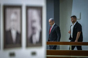 Israeli Prime Minister Benjamin Netanyahu walking outside his office at the Knesset on Nov. 11, 2024. Photo by Chaim Goldberg/Flash90.