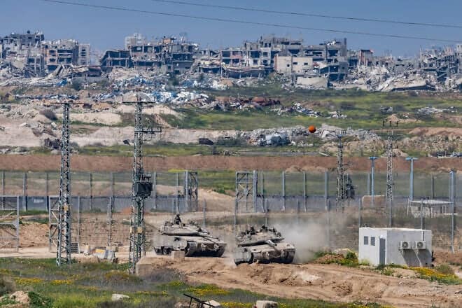 IDF tanks seen on the Israeli border with the Gaza Strip, on March 18, 2025. Photo by Chaim Goldberg/Flash90.