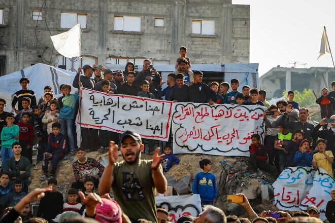 Palestinians in the northern Gaza Strip take part in an anti-Hamas protest on March 26, 2025. Photo by Flash90.
