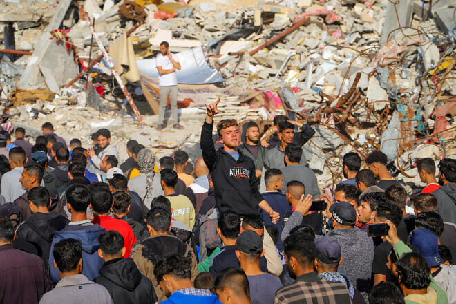 Palestinians take part in an anti-Hamas protest, calling to end the war with Israel, in Beit Lahia, in the northern Gaza Strip, March 26, 2025. Credit: Flash90.