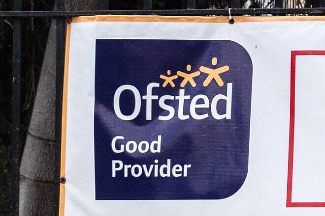 A banner showing a school's Ofsted rating is displayed outside a London school on March 21, 2023. Photo by Carl Court/Getty Images.