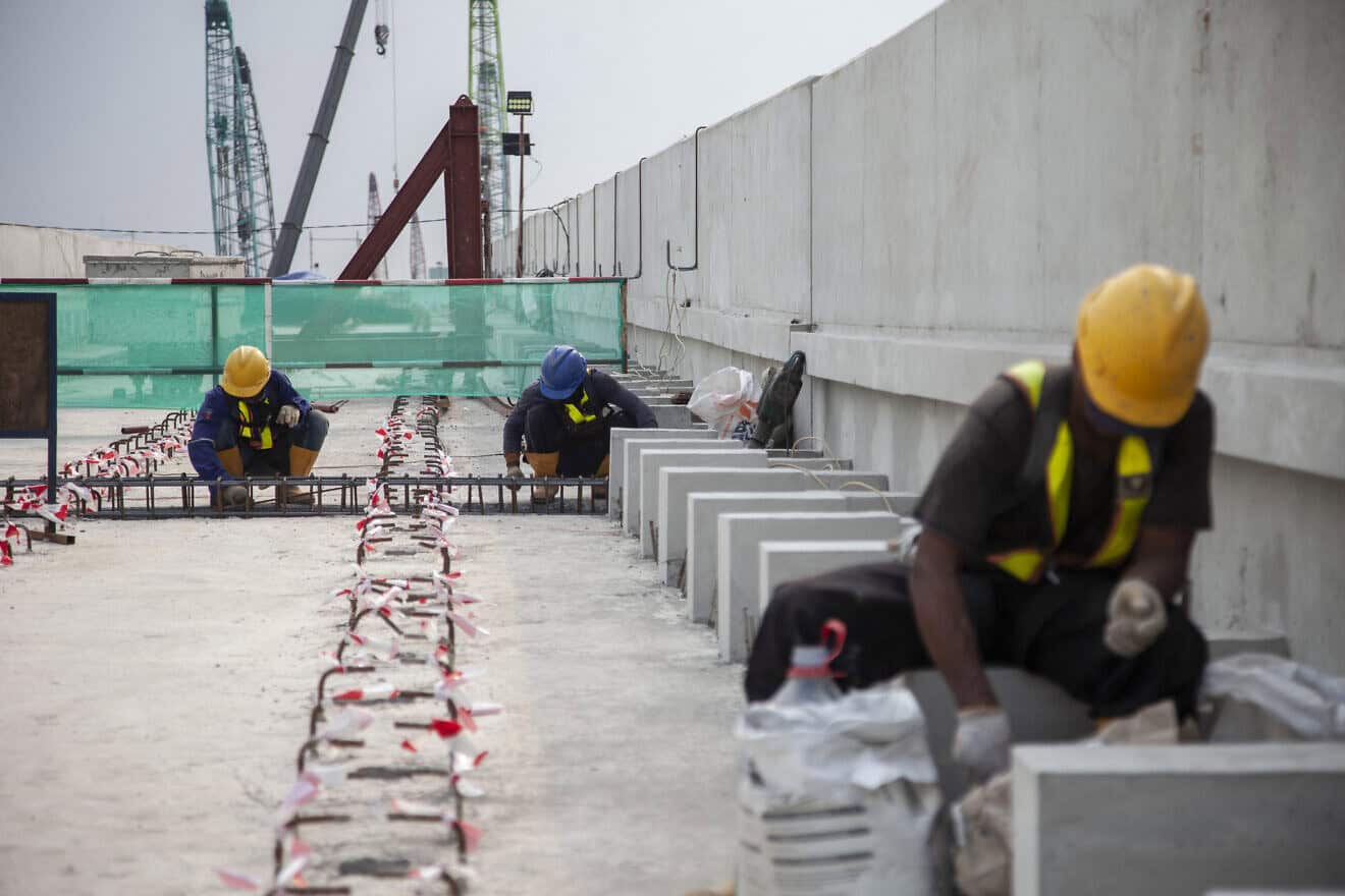 Workers work at the construction site of the Jakarta Light Rail Transport (LRT) Phase 1B in Jakarta on July 18, 2024. Photo by Aditya Irawan/AFP via Getty Images.