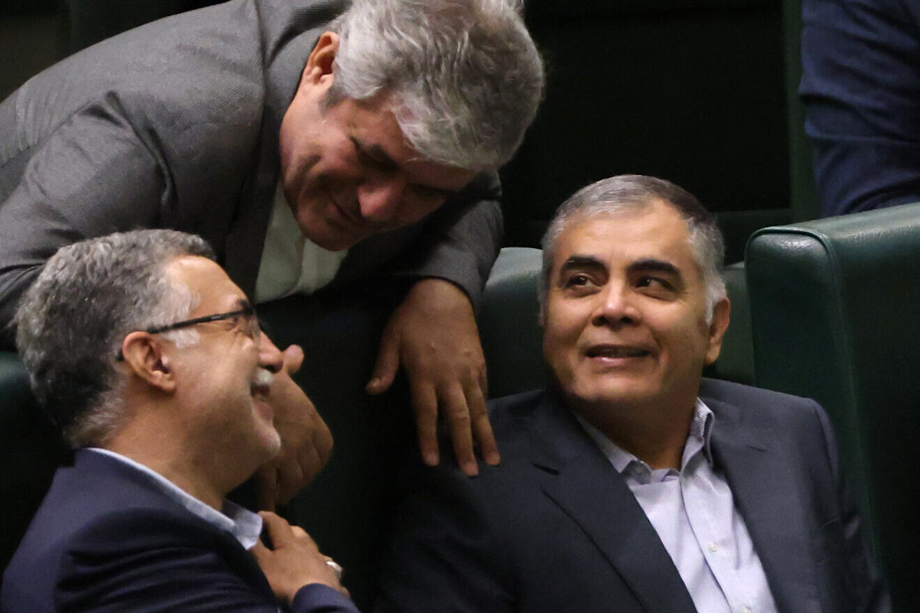 Mohsen Paknejad (right), Iran's nominee for the oil ministry, attends a parliament session in the capital Tehran, on Aug. 17, 2024. Photo by Atta Kenare/AFP via Getty Images.