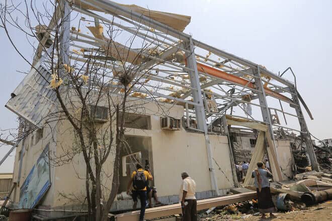 People check the destruction at a power station at the port in Yemen's rebel-held Hodeida city, a day after it was targeted in Israeli strikes, on Sept. 30, 2024. Photo by -/AFP via Getty Images.