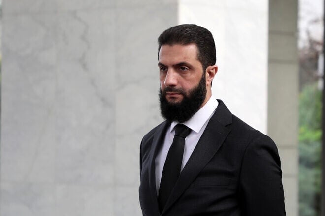 Syrian leader Ahmed al-Sharaa ahead of a meeting with Ukrainian Foreign Minister Andrii Sybiha in Damascus, on Dec. 30, 2024. Photo by Ali Haj Suleiman/Getty Images.