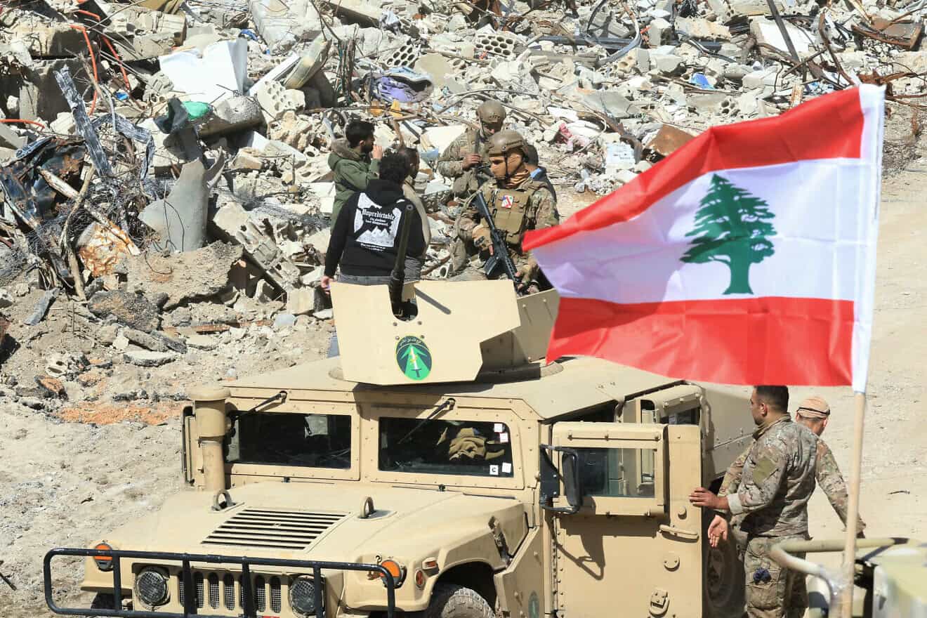 Lebanese troops patrol the destroyed southern border village of Adaisseh following the withdrawal of Israeli forces, on Feb. 18, 2025. Photo by Mahmoud Zayyat/AFP via Getty Images.