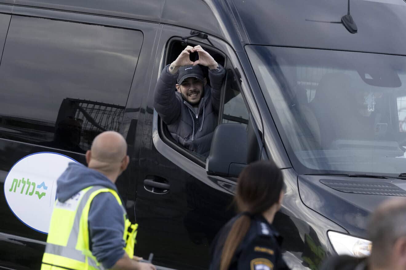 Freed hostage Eliya Cohen thanks supporters after landing at Rabin Medical Center's Beilinson Hospital in Petach Tikvah, on Feb. 22, 2025. Photo by Amir Levy/Getty Images.