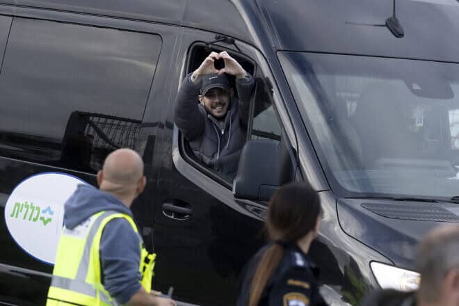 Freed hostage Eliya Cohen thanks supporters after landing at Rabin Medical Center's Beilinson Hospital in Petach Tikvah, on Feb. 22, 2025. Photo by Amir Levy/Getty Images.