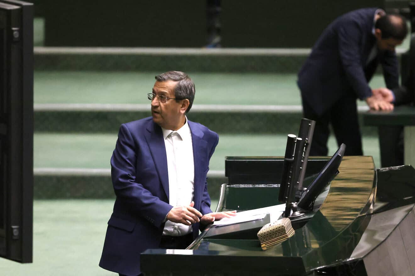 Iran's Finance Minister Abdolnaser Hemmati delivers a speech to members of parliament in Tehran during impeachment proceedings against him, on March 2, 2025. Photo by Atta Kenare/AFP via Getty Images.