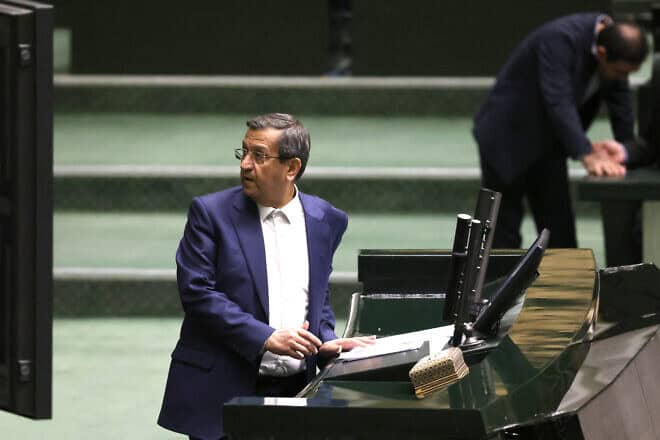 Iran's Finance Minister Abdolnaser Hemmati delivers a speech to members of parliament in Tehran during impeachment proceedings against him, on March 2, 2025. Photo by Atta Kenare/AFP via Getty Images.