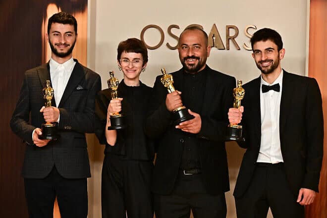 From left: Israeli journalist and filmmaker Yuval Abraham, U.S. producer Rachel Szor, Emirati filmmaker Hamdan Ballal and Palestinian journalist and filmmaker Basel Adra pose in the press room with the Oscar for Best Documentary Feature for “No Other Land” during the 97th Annual Academy Awards at the Dolby Theatre in Hollywood, Calif., on March 2, 2025. Photo by Frederic J. Brown/AFP via Getty Images.