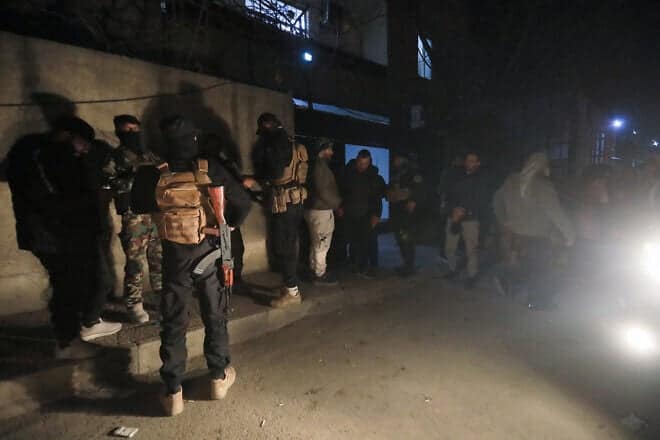 Members of Syria's new security forces deploy in the mostly Druze and Christian Jaramana suburb of Damascus late on March 2, 2025. Photo by Bakr Alkasem/AFP via Getty Images.