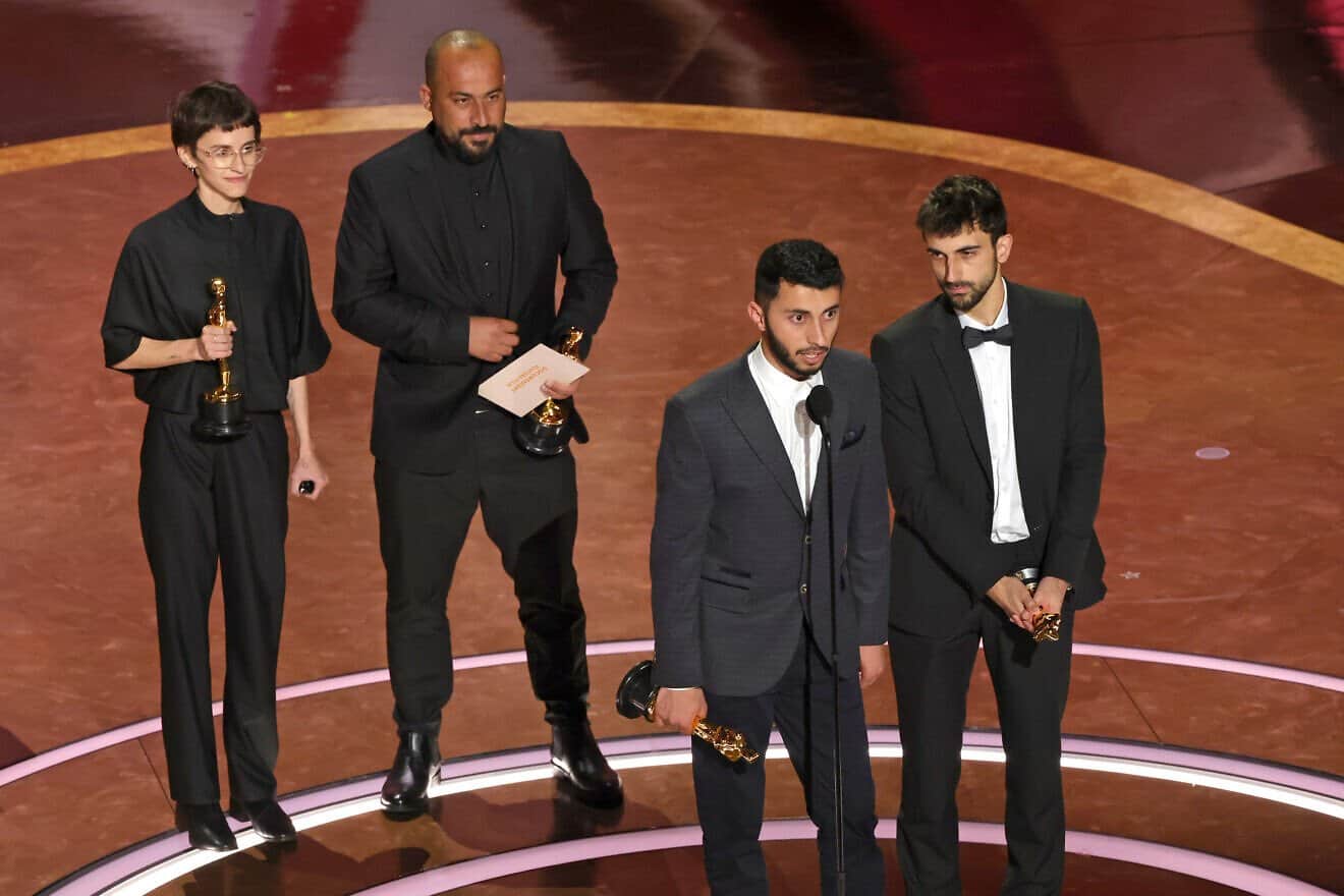 Israeli journalist and filmmaker Yuval Abraham and Palestinian journalist and filmmaker Basel Adra accept the Oscar for Best Documentary Feature for their film “No Other Land,” during the 97th Annual Academy Awards at the Dolby Theatre in Hollywood, Calif., on March 2, 2025. Photo by Kevin Winter/Getty Images.