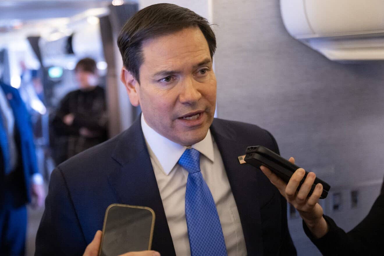 U.S. Secretary of State Marco Rubio speaks with the media on his military airplane as he flies to Jeddah, Saudi Arabia, on March 10, 2025. Photo by Saul Loeb/POOL/AFP via Getty Images.