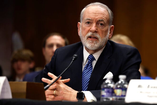 Former Arkansas Gov. Mike Huckabee, U.S. President Donald Trump's nominee to be ambassador to Israel, testifies during his Senate Foreign Relations Committee confirmation hearing at the Dirksen Senate Office Building on March 25, 2025. Photo by Kevin Dietsch/Getty Images.